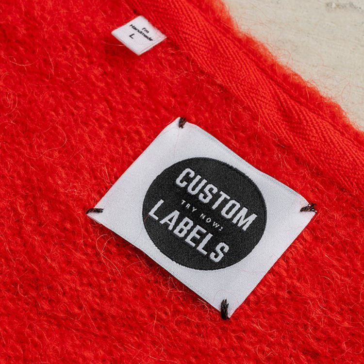 Textile material for garment hang tags